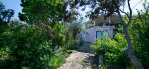 Villa Fronte Mare a Pittulongu (Olbia) - Ottima Posizione con Potenziale di Ristrutturazione