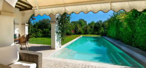 Elegante villa con piscina a Is Molas