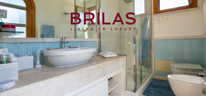 Elegante villa con piscina a Is Molas