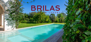 Elegante villa con piscina a Is Molas