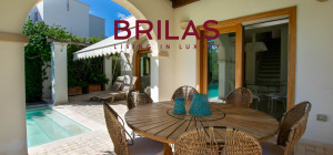 Elegante villa con piscina a Is Molas