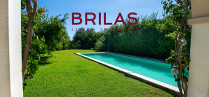 Elegante villa con piscina a Is Molas