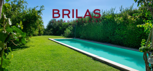 Elegante villa con piscina a Is Molas
