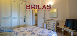 Villa con vista mare, giardino privato e verande coperte