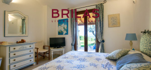 Villa con vista mare, giardino privato e verande coperte