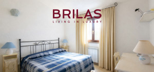 Villa con vista mare, giardino privato e verande coperte