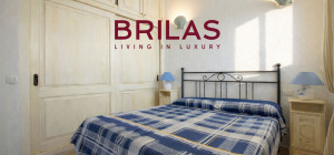 Villa con vista mare, giardino privato e verande coperte